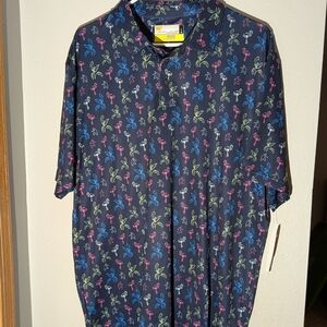 Men's Black Polo with Multicolor Leaf Print — Performance Style